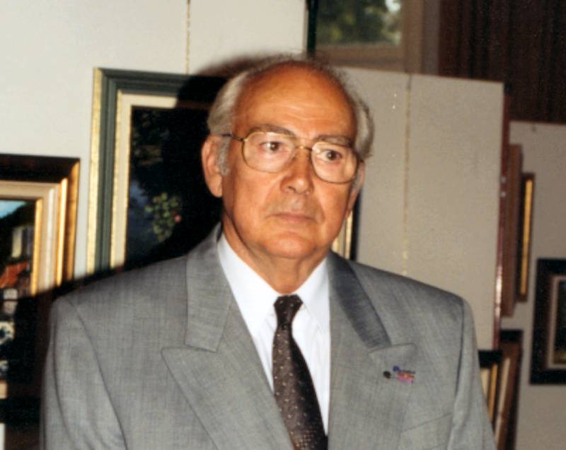 Le peintre Delcourt lors de l'exposition 1999  Andenne.